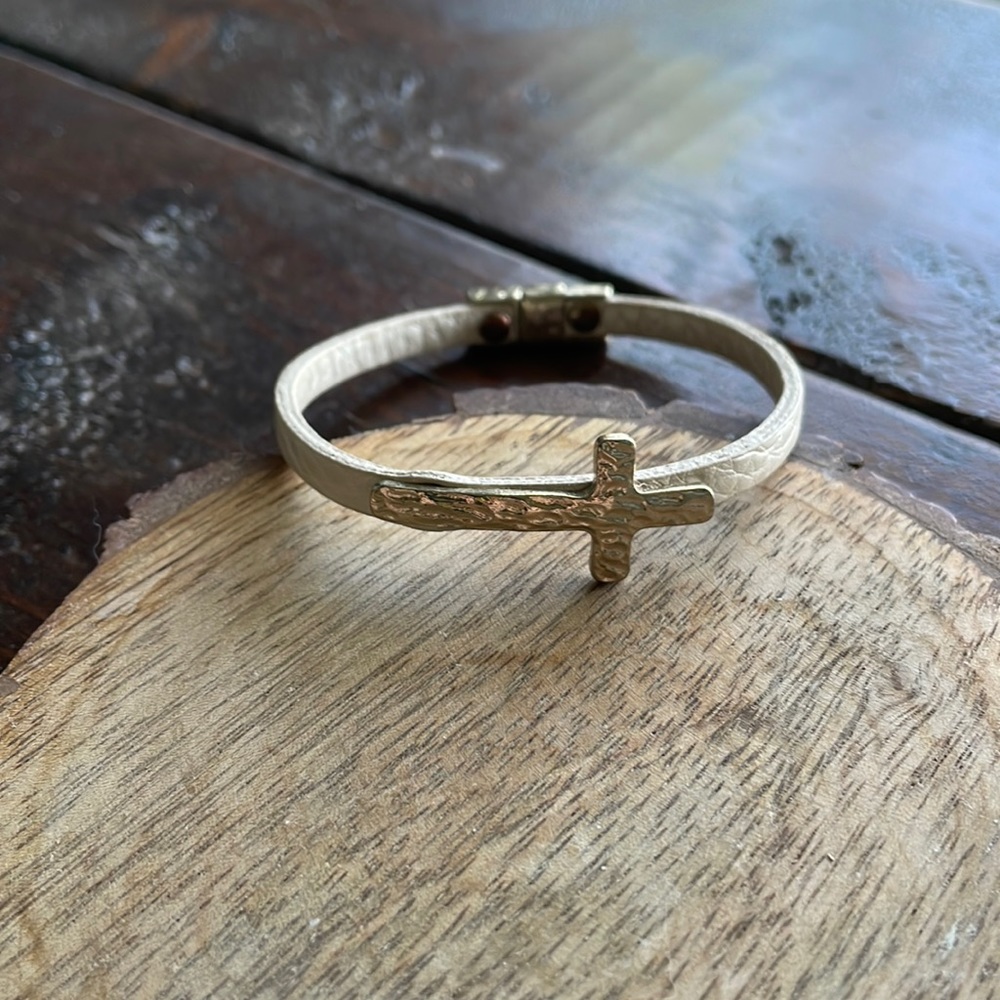 gold cross nude leather like bracelet